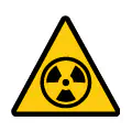 Señal de advertencia de materiales radiactivos. Símbolo técnico de radiactividad.