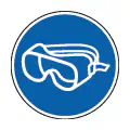Pictograma vectorial de gafas antisalpicadura. Símbolo de protección ante agentes químicos.